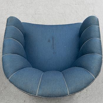 A pair of 1950's armchairs.