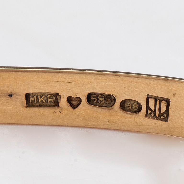 Armring, 14K guld och spektrolit, Kaunis Koru, Helsingfors 1979.