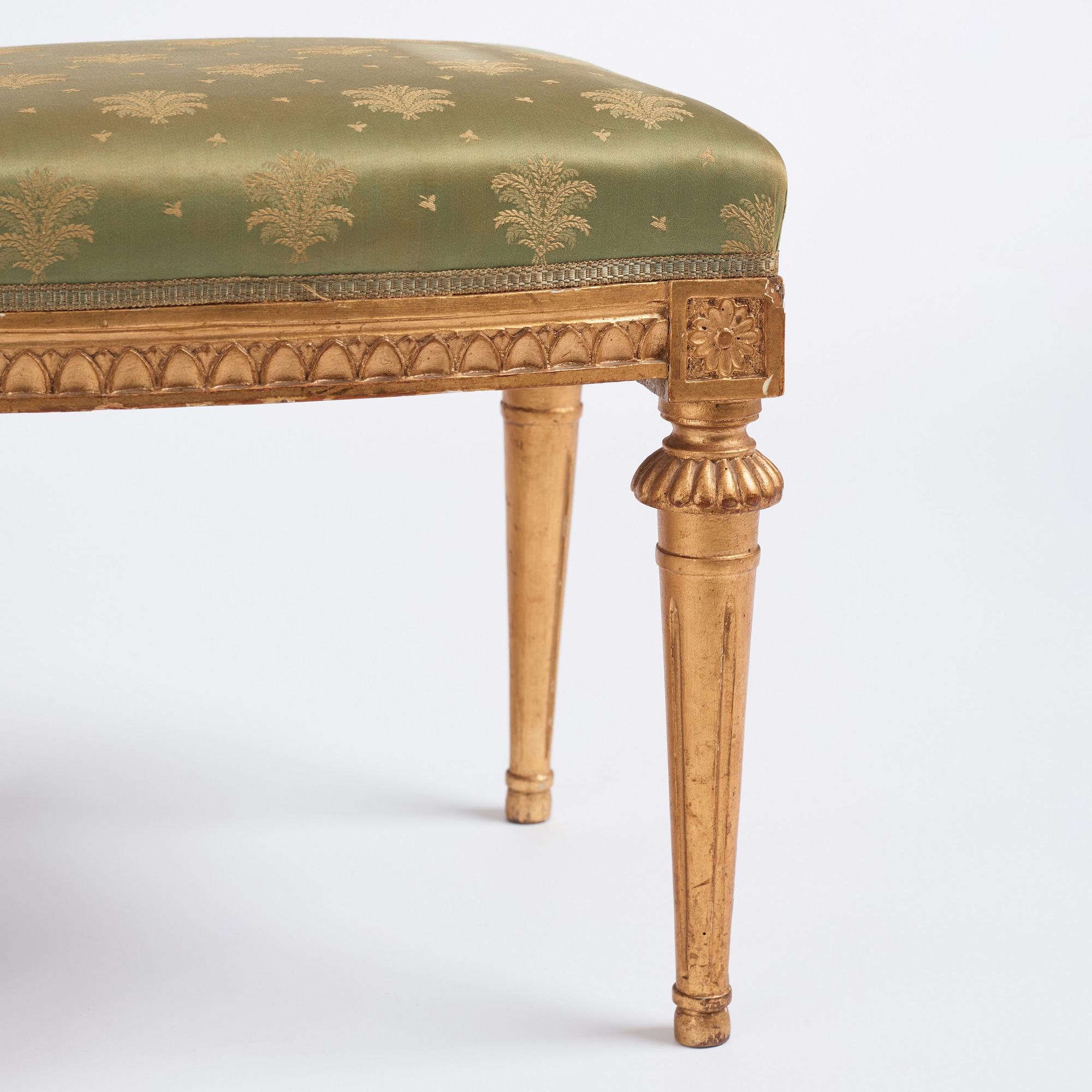 A pair of Gustavian giltwood stools by E. Ståhl (master in Stockholm 1794-1820).