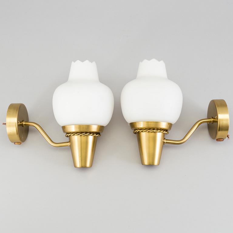 A pair of brass wall lights, mid 20th Century.