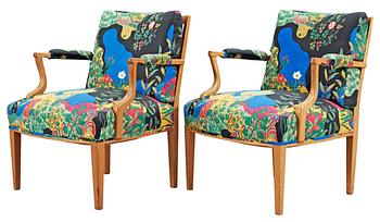 A pair of Josef Frank mahogany and rattan armchairs, Svenskt Tenn,