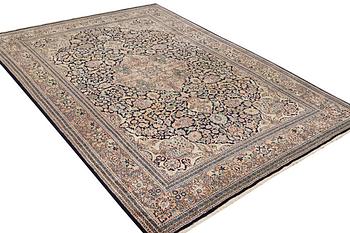 A Kashmir carpet, silk, c. 333 x 234 cm.