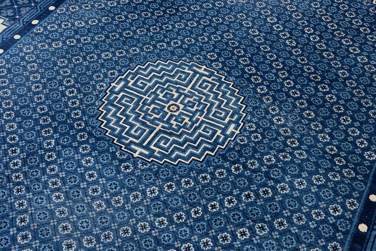 A semi-antique Baotou carpet, West China, c. 335 x 246 cm.