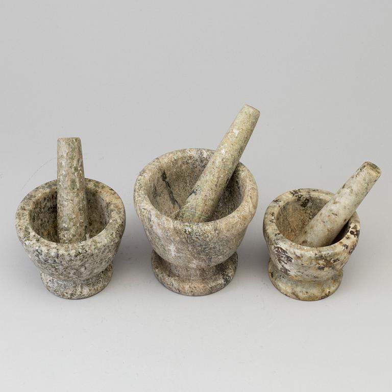 THREE SWEDISH GREEN MARBLE MORTARS AND PESTLES.