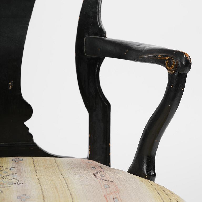 A pair of Swedish rococo open-back armchairs, Stockholm, late part 18th century.
