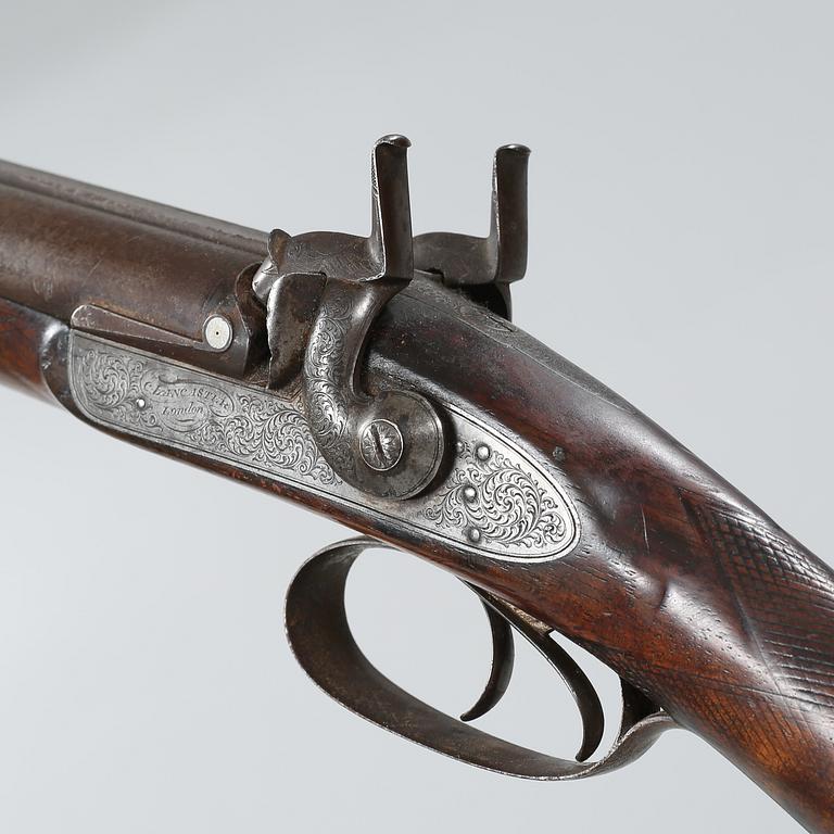 A percussion rifle by Charles William Lanchester in London, around the mid 19th century.