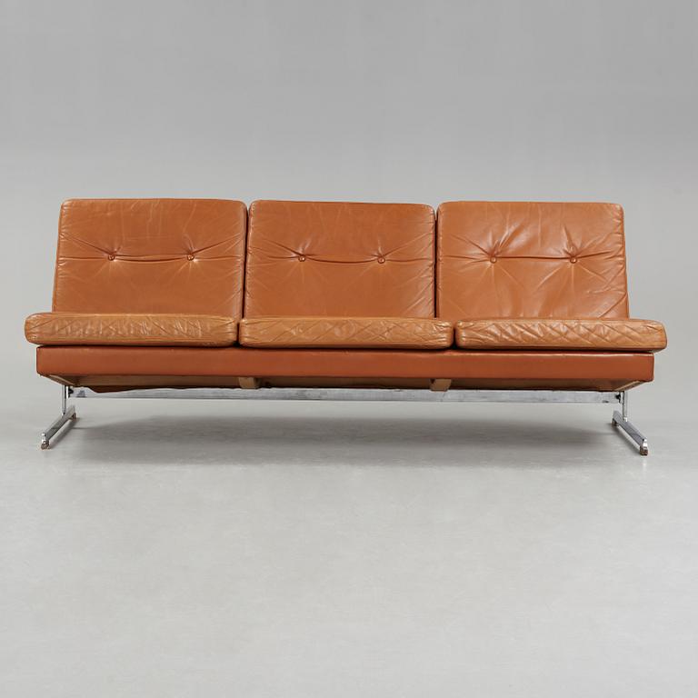 A Poul Nørreklit chromed steel and brown leather three seated sofa, Selectform, Denmark 1960's.
