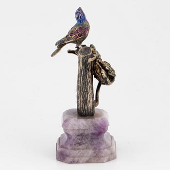 Silver and coloured stone bird sculpture.