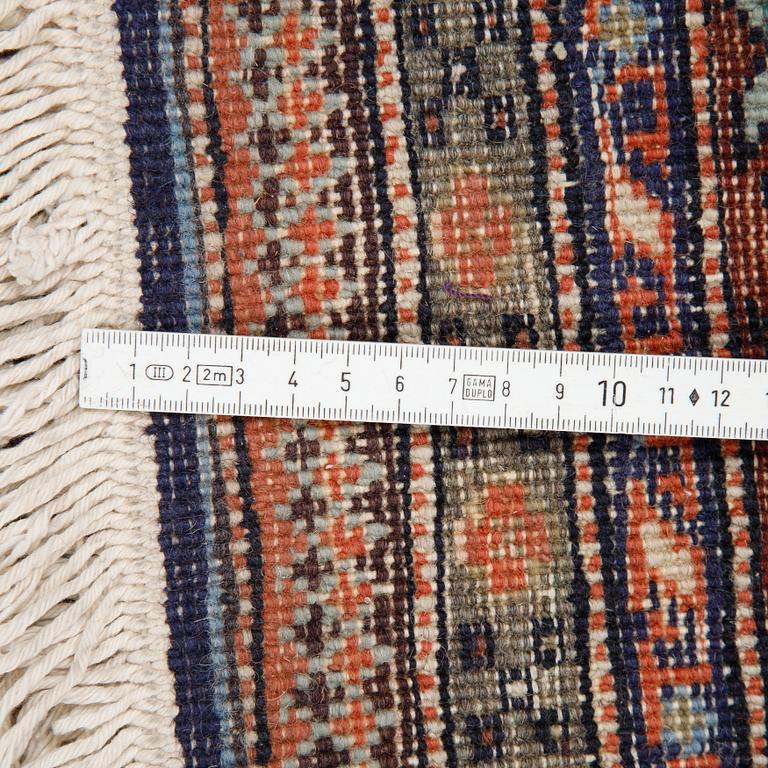 A carpet, semi-antique/Old Ardabil, ca 264 x 272 cm.