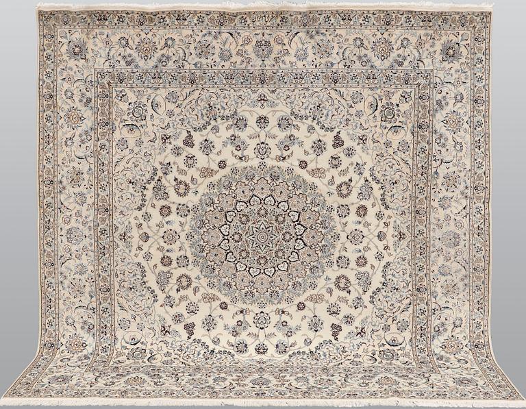 A Nain part silk carpet, 210 x 200 cm.