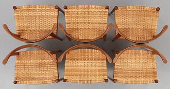 Hans J. Wegner, a set of six teak and rattan "Cowhorn Chairs" "JH-505", executed by cabinetmaker Johannes Hansen, Denmark 1950-60's.