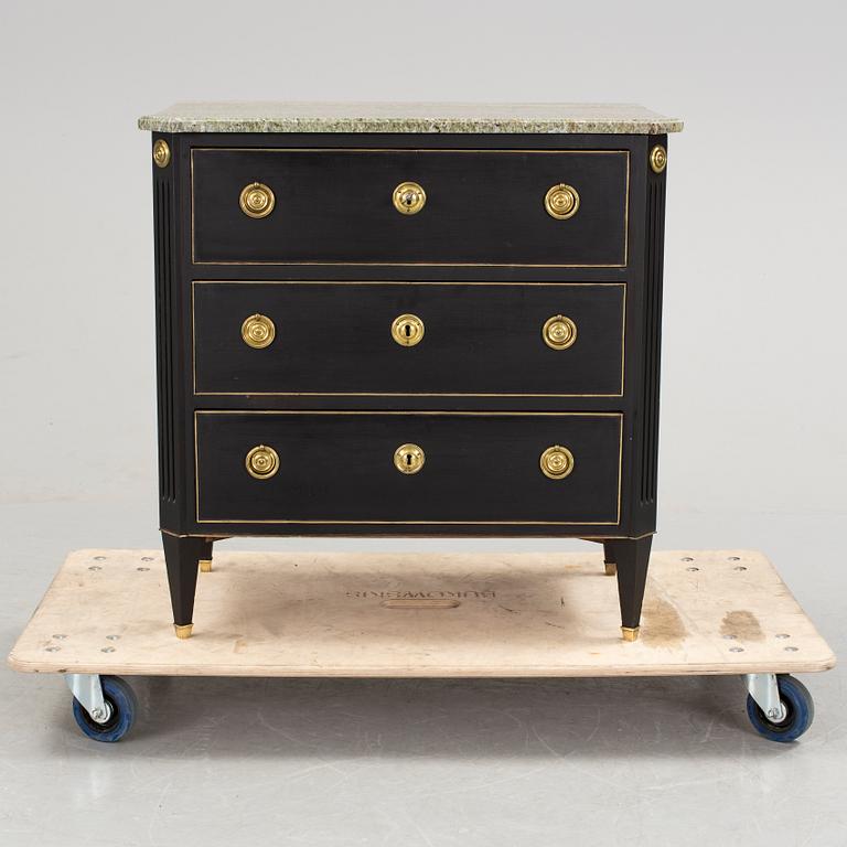 A 20th century chest of drawers.