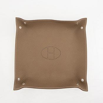 Hermès,  a leather  Mises et Relances tray 2021.
