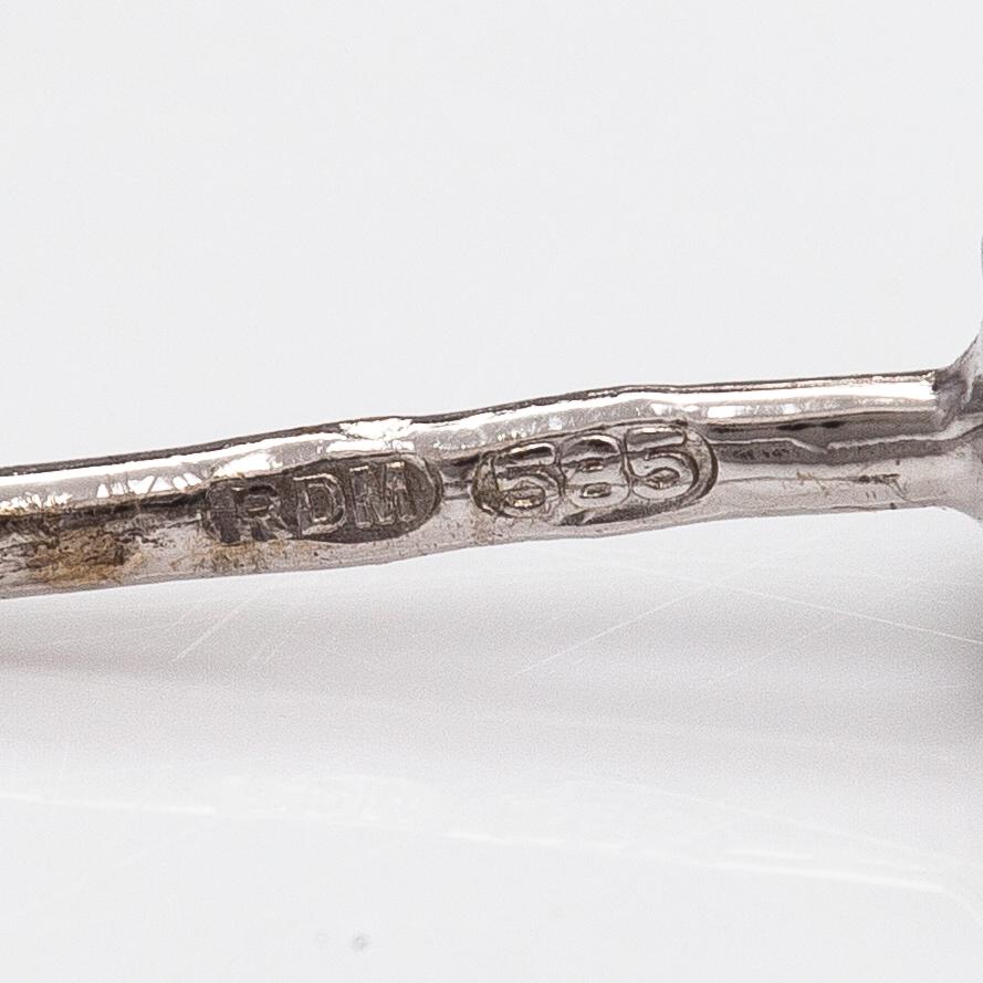 A pair of 18K white gold earrings with diamonds ca. 0.40 ct in total.