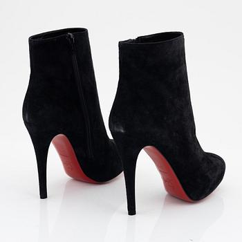 Christian Louboutin, à par of boots, size 37 1/2.