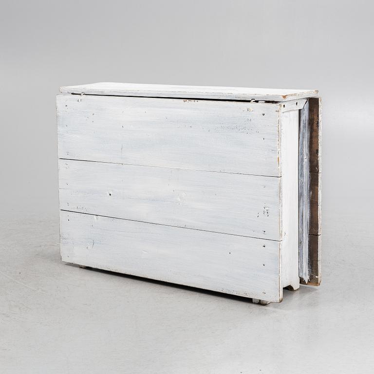 A painted gateleg table, 19th Century.