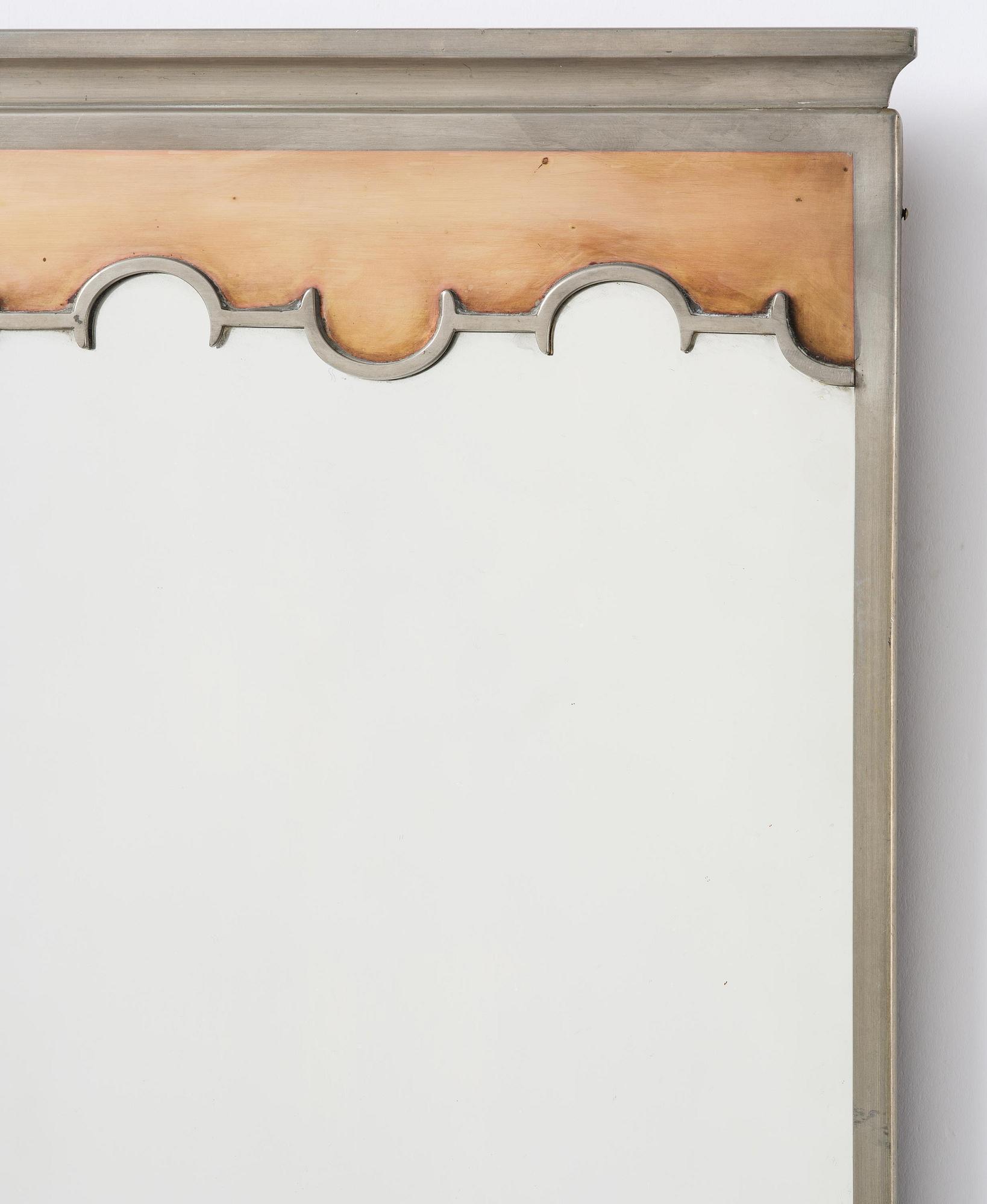 Nils Fougstedt, a rare pewter and brass wall mirror model A 679, Firma Svenskt Tenn, Stockholm, 1932.