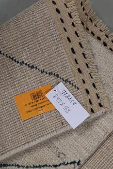 A rug, Morocco, ca 243 x 168 cm.