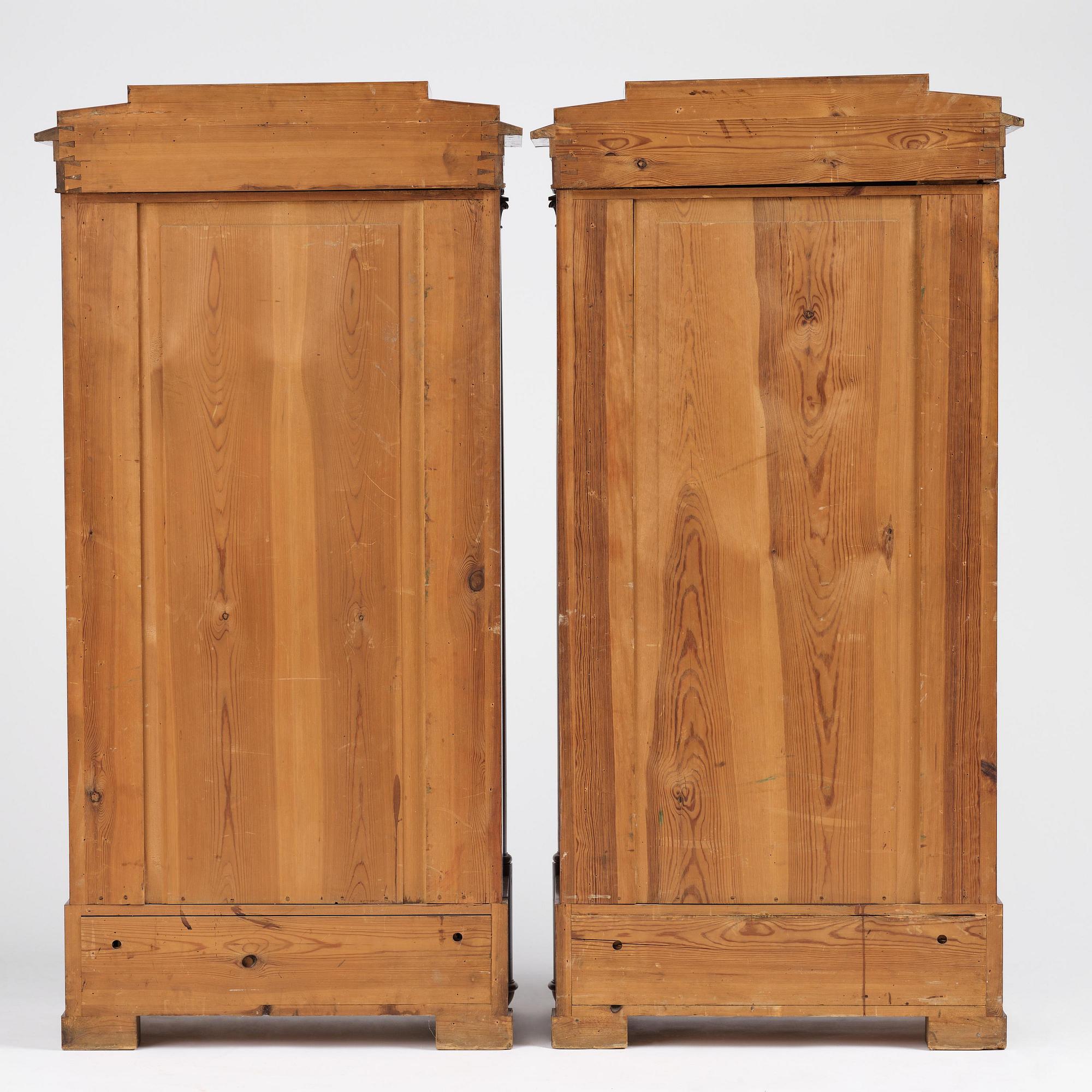 A pair of Swedish Empire mahogany bibliothèques, Stockholm, early 18th century.