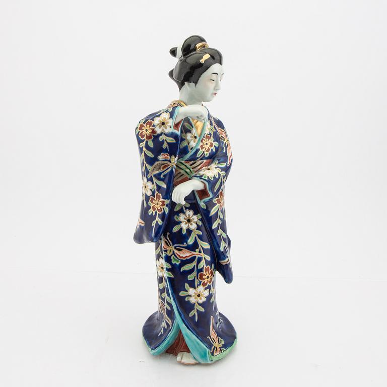 A Japanese porcelain figurine early 1900s.