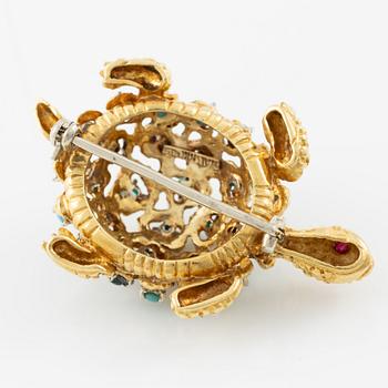 Brooch in the form of a tortoise, 18K gold with turquoises and rubies, Italy.
