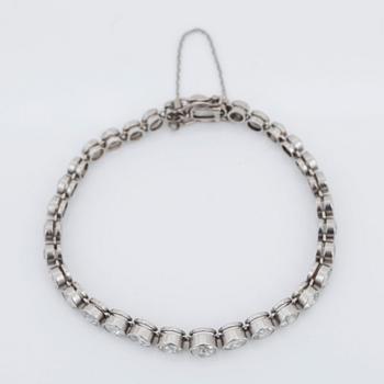 A graduated old-cut diamond line bracelet. Total carat weight of diamonds circa 9.00 cts.