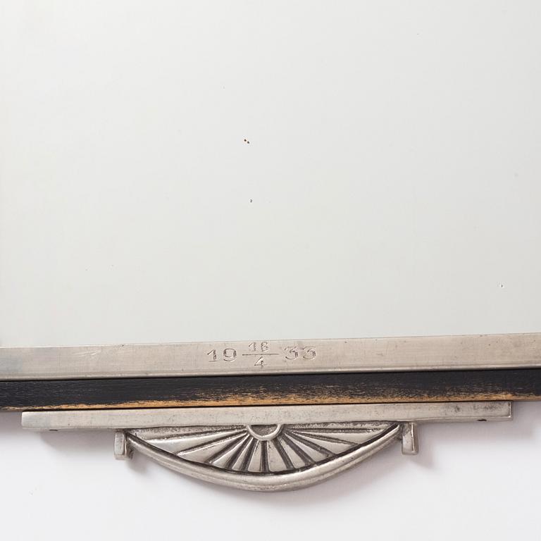 Oscar Antonsson, a Swedish Grace pewter framed mirror, Ystad Tenn, Sweden 1928.
