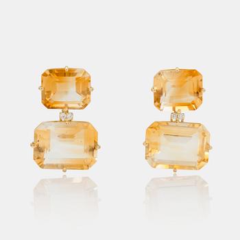 1121. A pair of citrine and brilliant -cut diamond earrings.