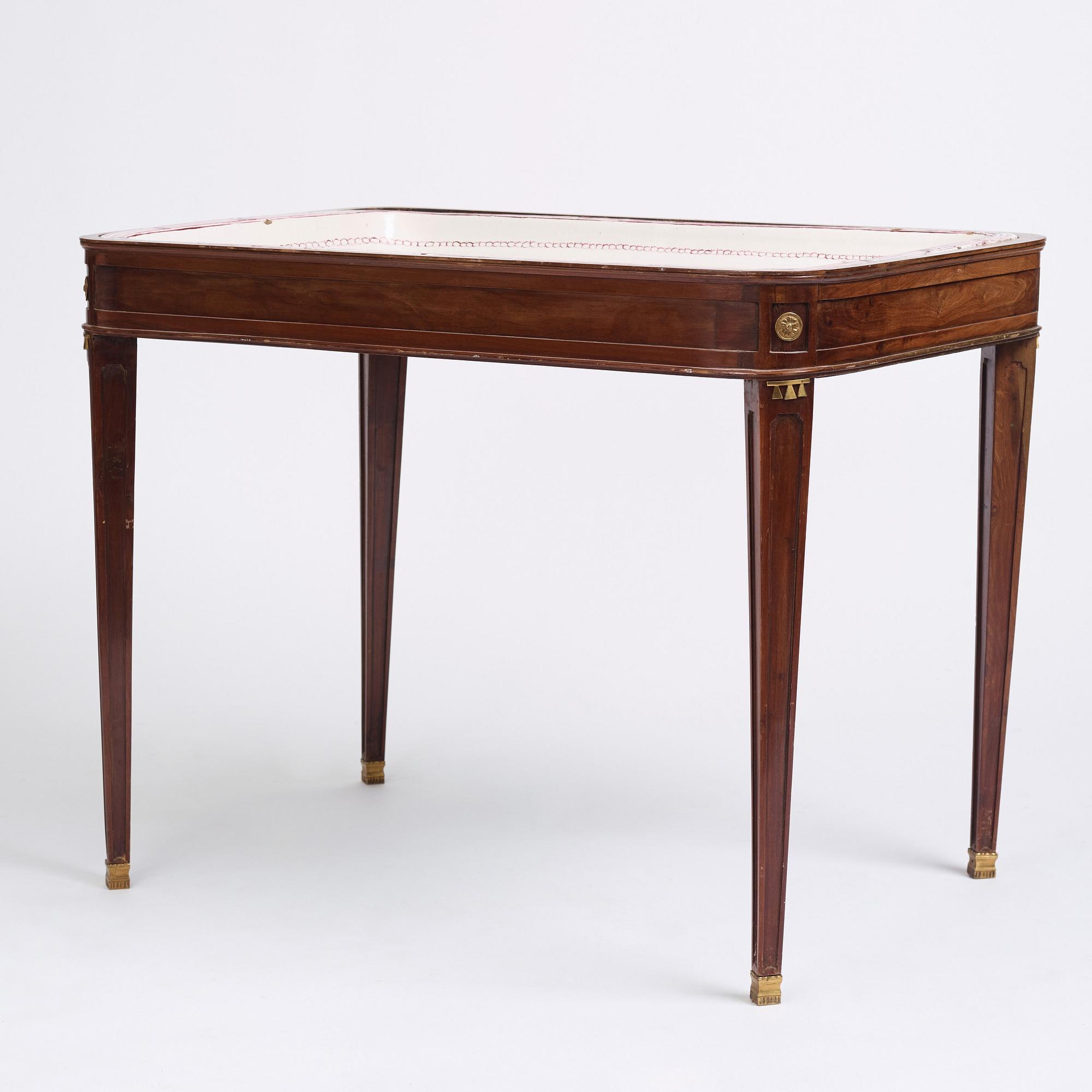 A Swedish Gustavian faience tea table, late 18th century.
