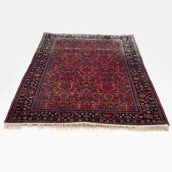 A Keshan rug, c. 200 x 135 cm.