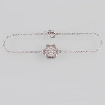 ARMBAND, 18K vitguld med briljantslipade diamanter ca 0.20 ct. Vikt 1,6 gram.