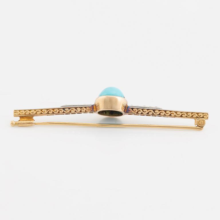 An 18K gold brooch set with a turquoise and old-cut diamonds.