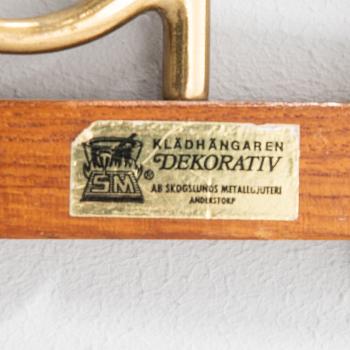 Clothes hangers, three "Decorative" Skoglund's Metal Foundry Anderstorp 1950s/60s.