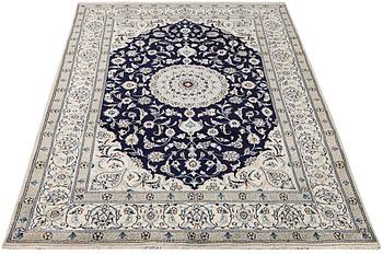 A part silk Nain rug, 9LA, c. 292 x 190 cm.