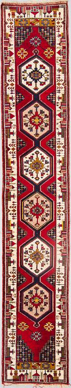 An oriental runner  possilby Anatolia, around 397 x 70 cm.