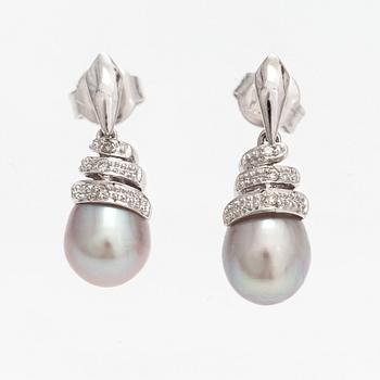 A pair of 14K white gold earrings with cultured pearls and diamonds ca. 0.06 ct in total. Caratia, Helsinki 2001.