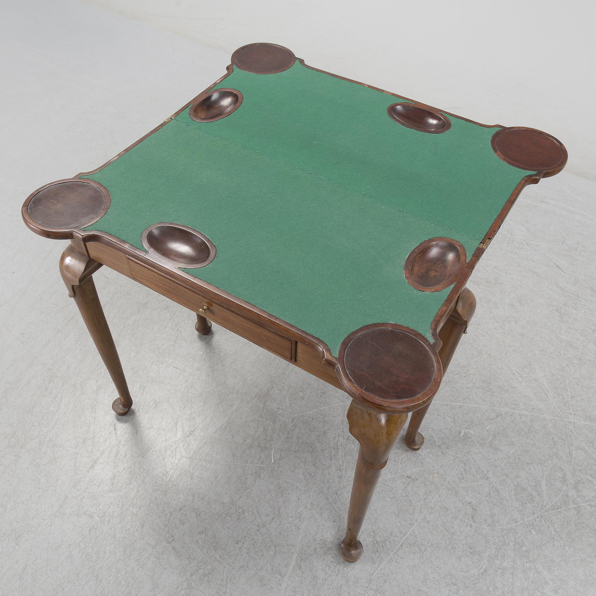 A mahogany games table, 18th Century.