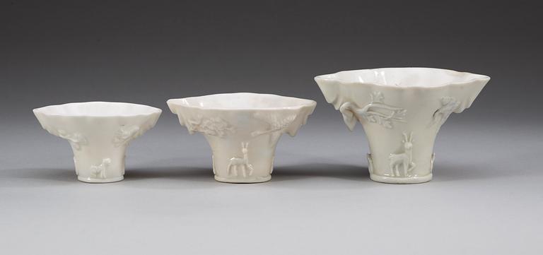 A set of three blanc de chine rhinoserous cups, Qing dynasty.