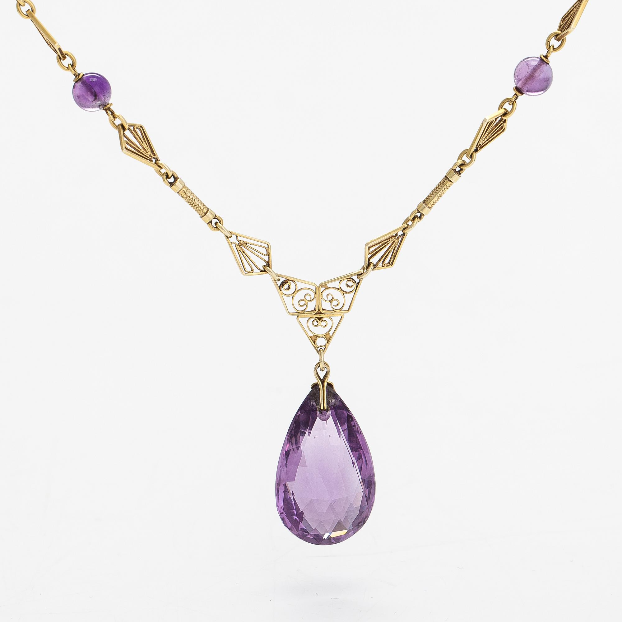 A 14K gold and amethyst neckalce.