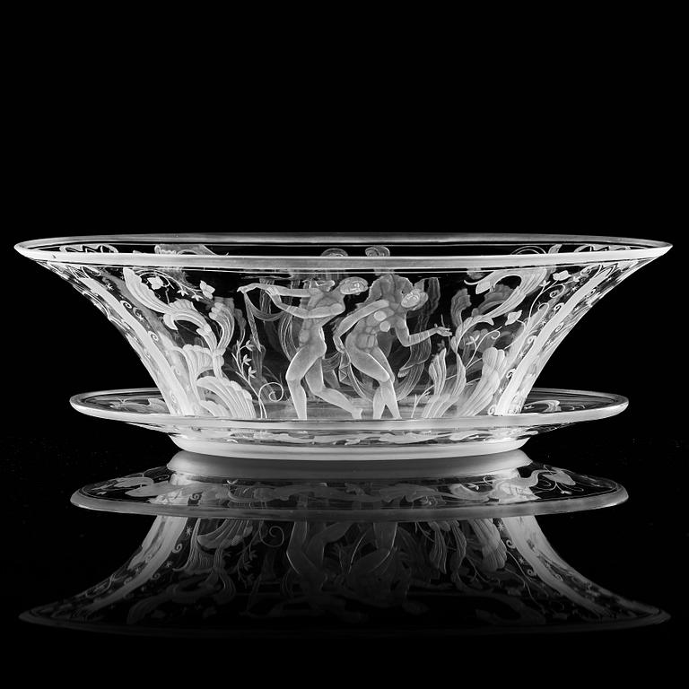 Simon Gate, a Swedish Grace engraved glass bowl with stand, Orrefors 1930, model 147, engraved by Karl Rössler.