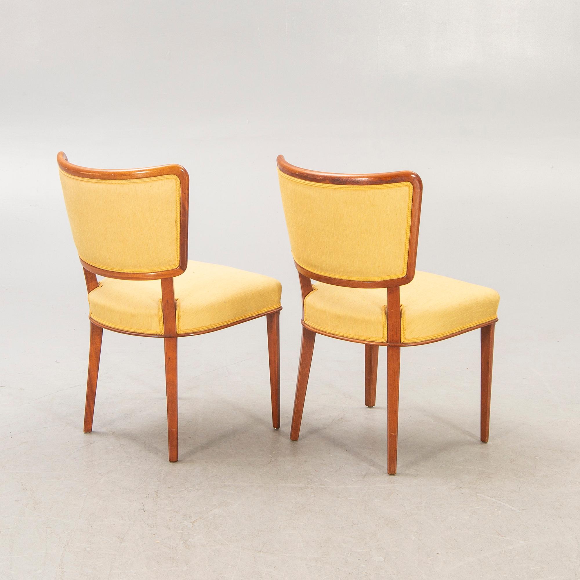 A set of ten Swedish modern 1950s mahogany chairs.