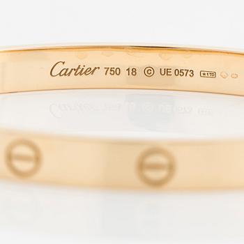 An 18K gold Cartier "Love" bracelet.