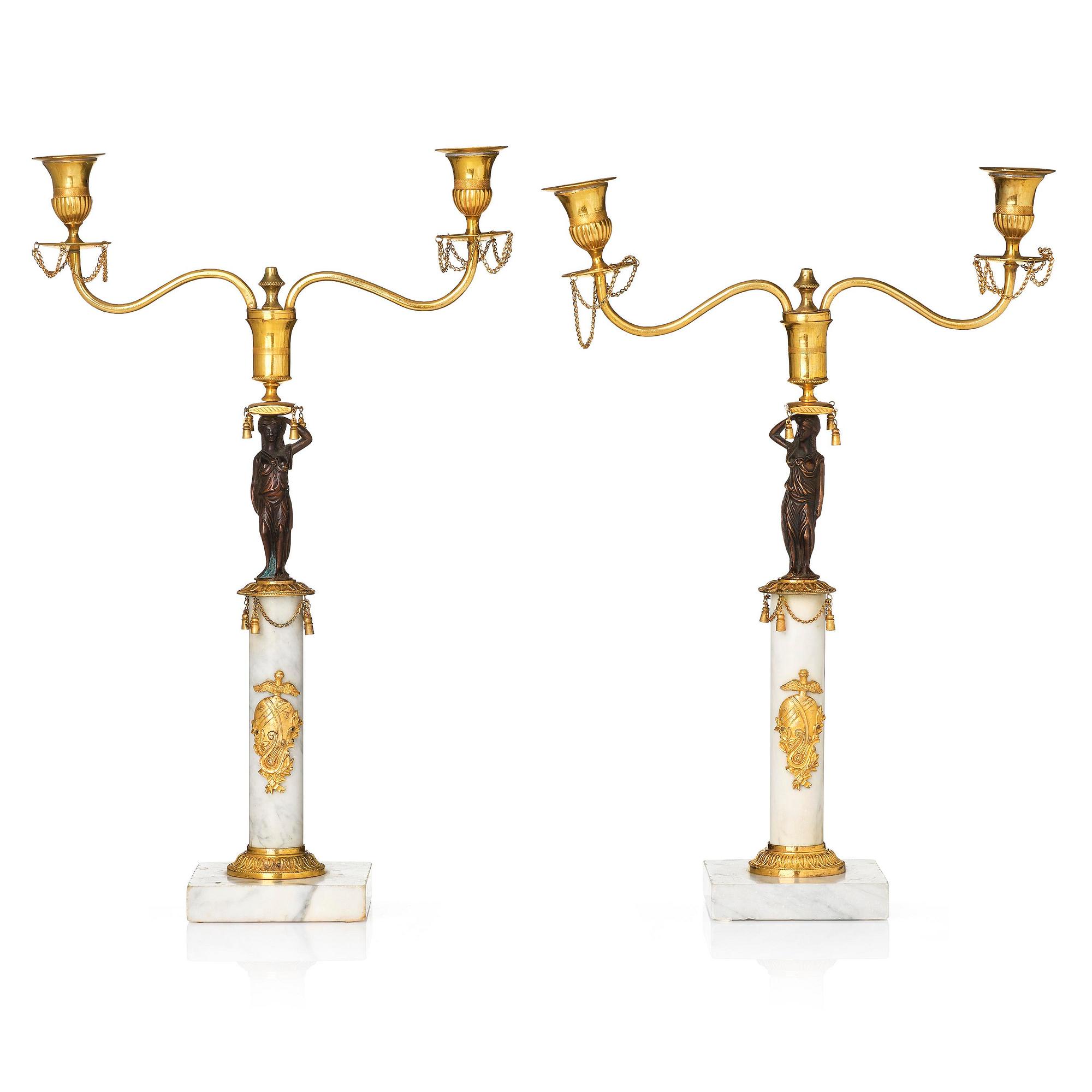 A pair of late Gustavian two-branch candelabra in the manner of F. L. Rung, Stockholm, circa 1800.