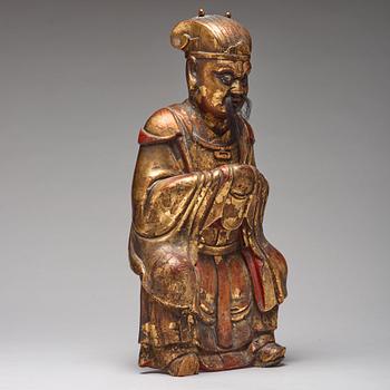 A large wooden sculpture of a Daoist dignitary, Qing dynasty, 17/18th Century.