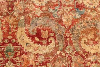 A carpet, antique, 17th century North east Safavid persia "Blossom and sickle", ca 311 x 156 cm.