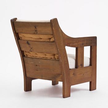 Carl Westman, a stained pine armchair, Sweden, ca 1910.