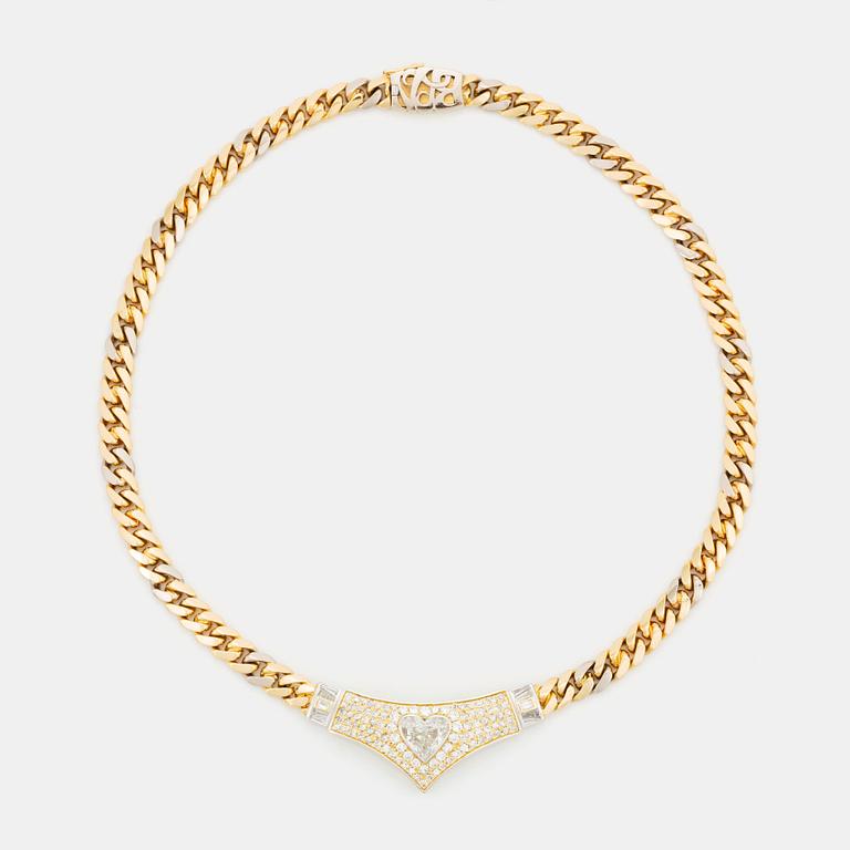 Collier 14K guld och platina med en hjärtformad briljantslipad diamant.