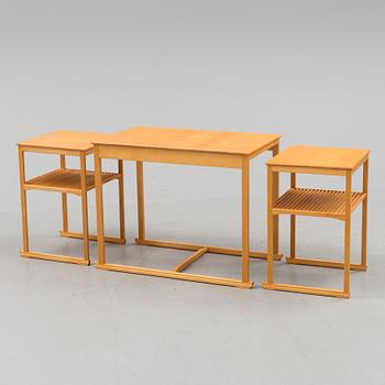 A Swedish Carl Malmsten "The Sled" birch side table nesting table i three parts, Åfors Möbelfabrik.