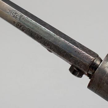 A Colt 1862 Pocket Navy percussion revolver with ivorygrip.