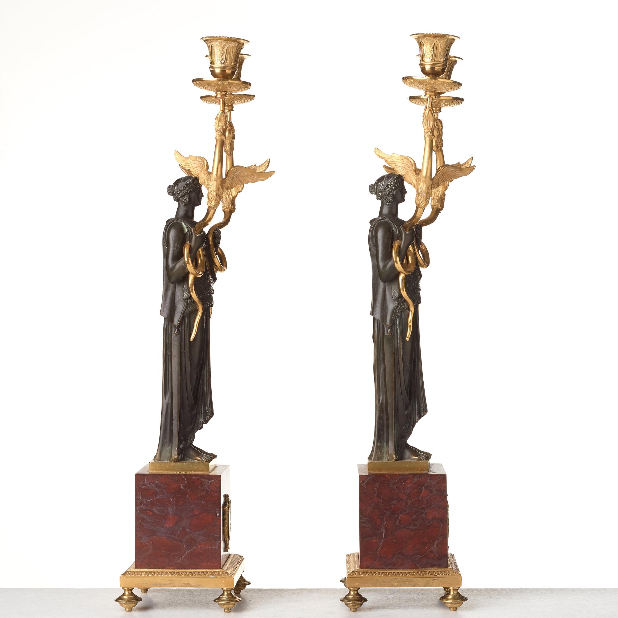 A pair of French Empire two-light candelabra, beginning of the 19th century.